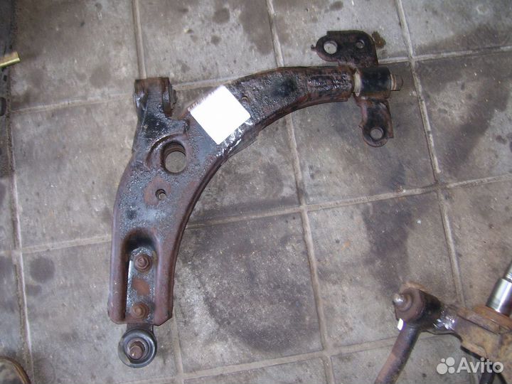 Киа спектра рычаг подвески