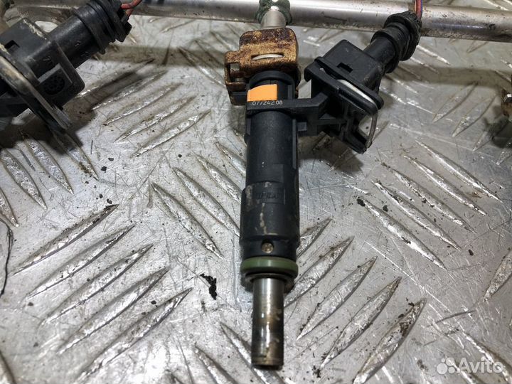 Форсунка двигателя Opel Astra H