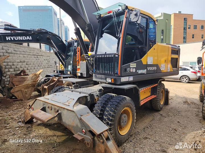 Колёсный экскаватор Volvo EW205D, 2021