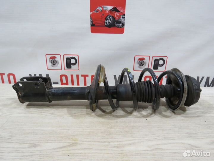 Амортизатор передний правый Nissan Almera G15
