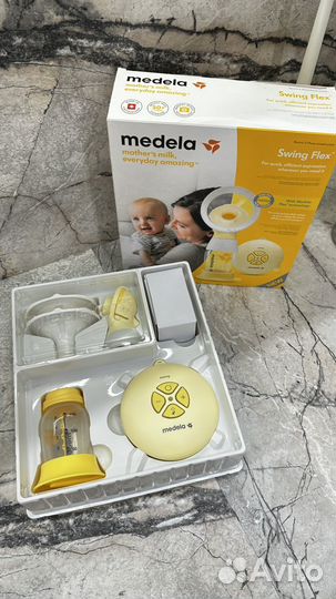 Молокоотсос medela электрический