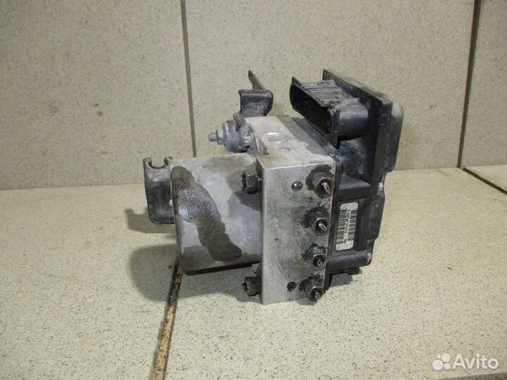 Блок ABS (насос) Nissan Tiida (C11)