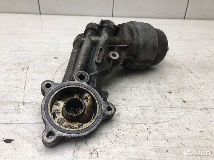 Корпус масляного фильтра Peugeot Partner M59 TU3A