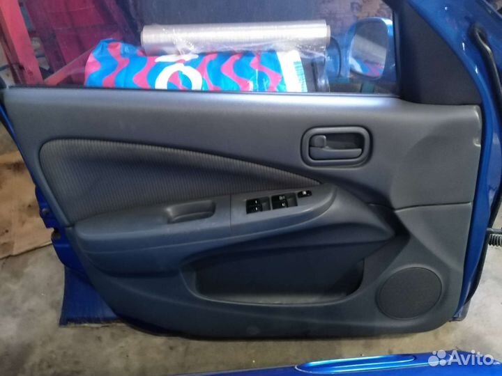 Обшивки дверей Nissan Almera Classic