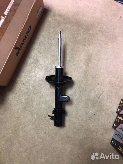 Амортизатор передний Kia новый EX546612E201