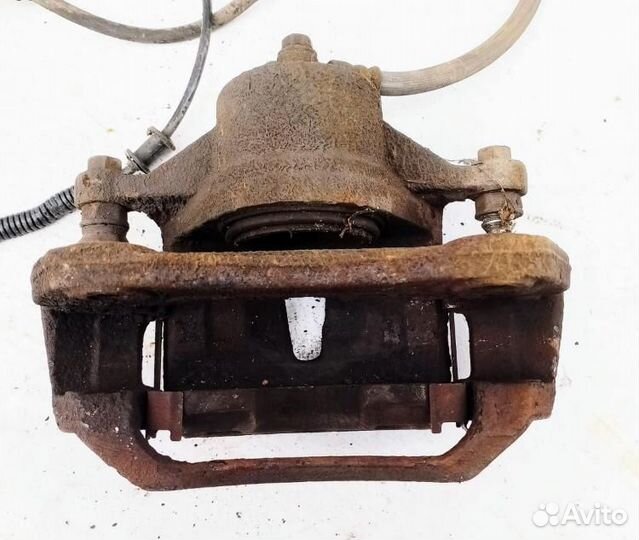 Суппорт тормозной передний левый 2007-2012 Kia Cee