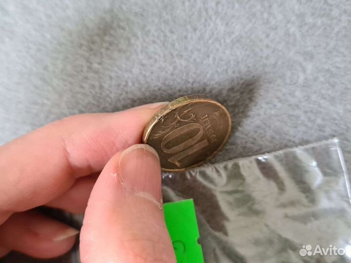 Монета с браком наплыв