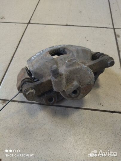 Суппорт тормозной передний левый Volkswagen Polo