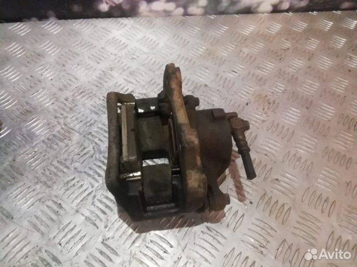 Тормозные суппорта переднее Nissan Primera P12 1.6