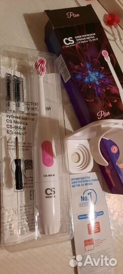 Электрическая зубная щетка