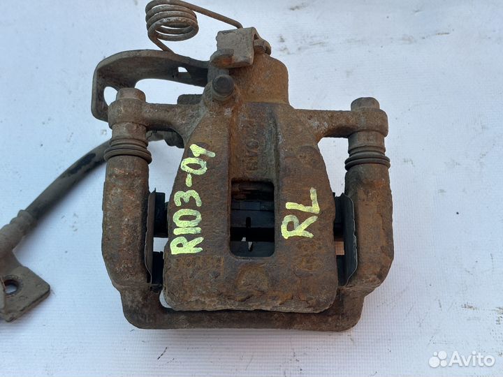 Суппорт задний левый правый Kia Rio 3 Hyundai Sola