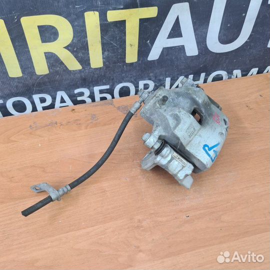 Суппорт тормозной передний правый Kia Seltos 1