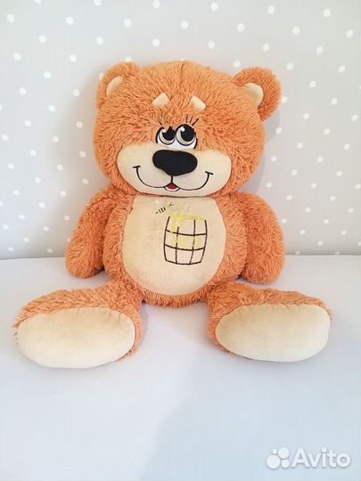 Большой плюшевый медведь
