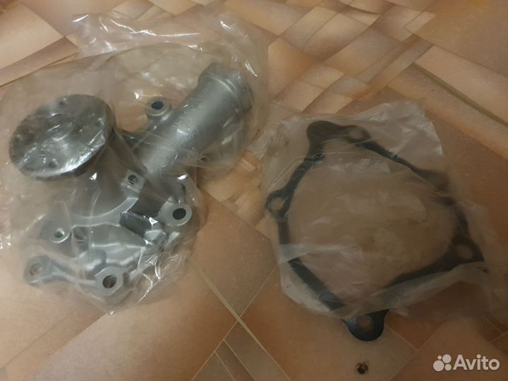 Помпа mitsubishi lancer