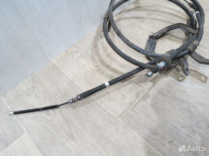 Трос стояночного тормоза Kia Rio 3