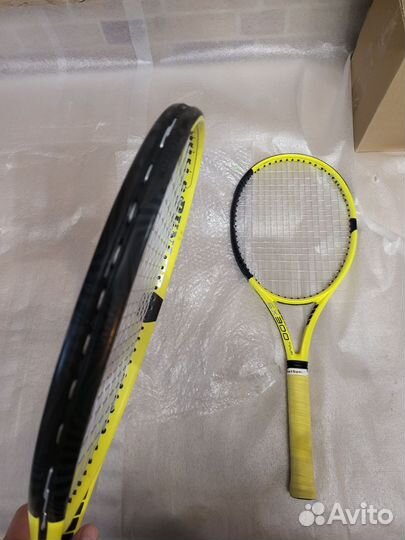 Теннисная ракетка
