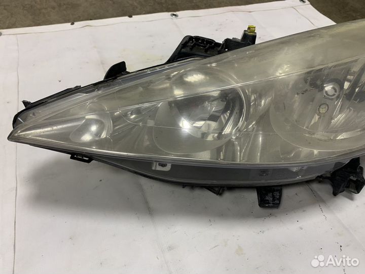Фара передняя левая Peugeot 207