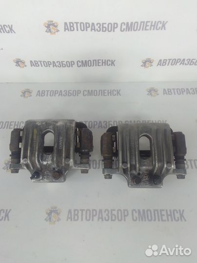 Суппорт задний левый / правый Hyundai Santa Fe