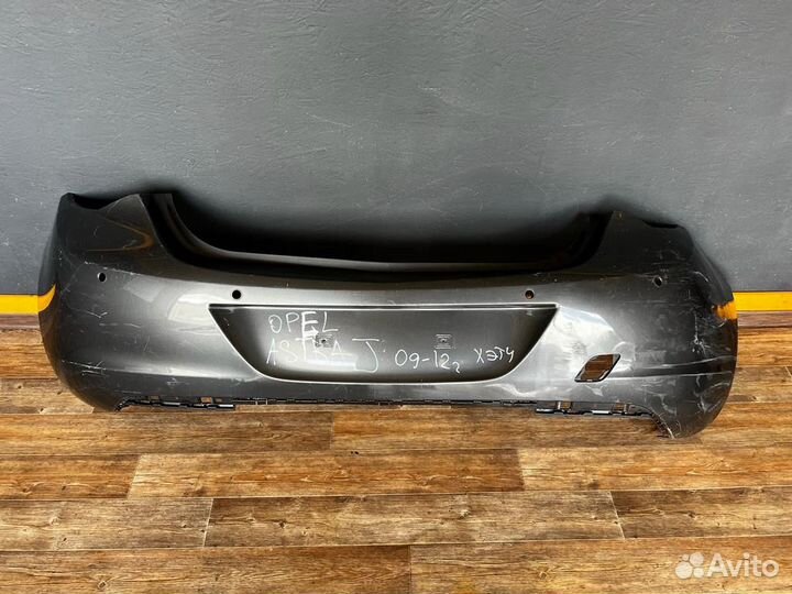Задний бампер Opel Astra J