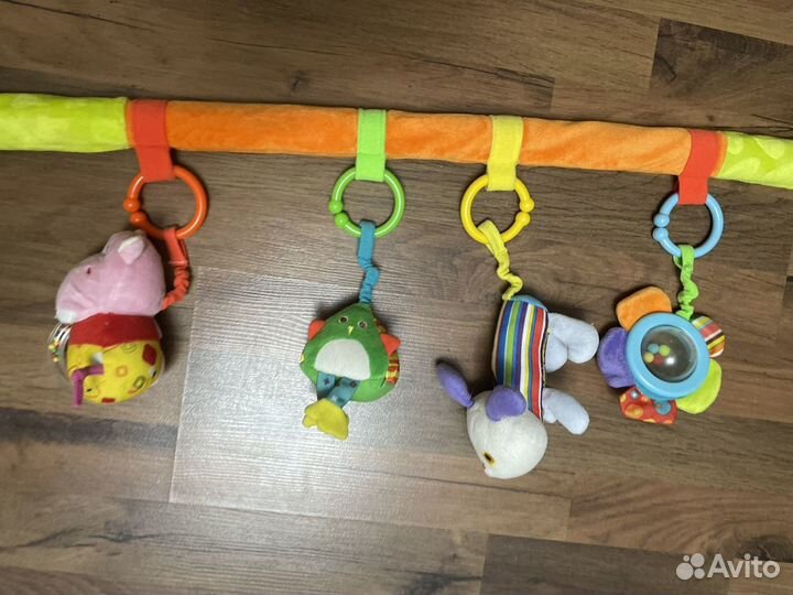 Развивающие игрушки дуга на кровать