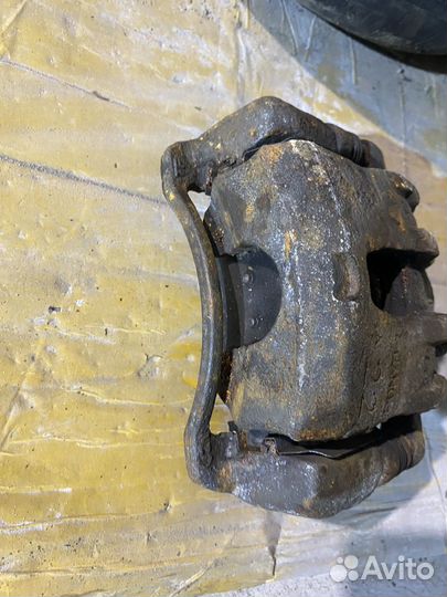 Суппорт тормозной передний Solaris