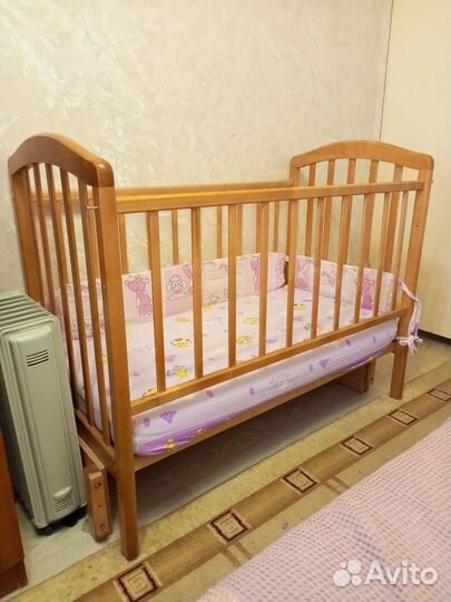 Кровать детская с механизмом качания