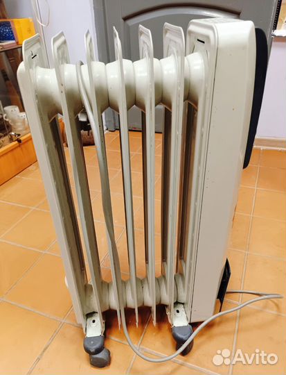 Масляный радиатор Delonghi