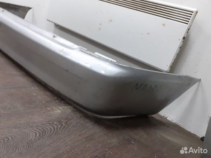 Бампер задний Mazda 323