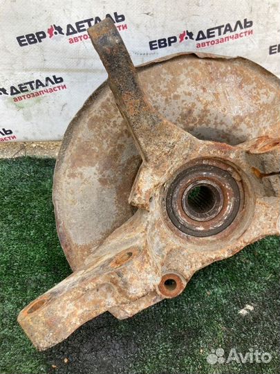 Кулак поворотный передний правый Mitsubishi Lancer