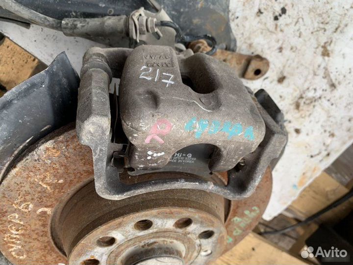 Суппорт задний правый Skoda Superb 2