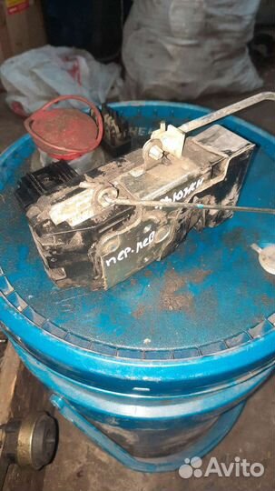 Замок двери передний левый Ford Fusion