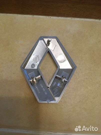 Эмблема Рено