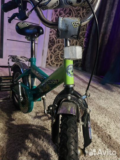 Детский четырёхколесный ведосипед