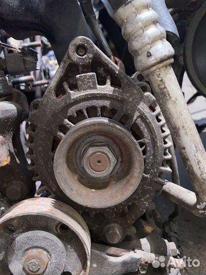 Генератор QG18DE Nissan Almera N16 23100BU010