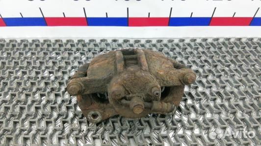 Суппорт тормозной передний левый toyota corolla E1