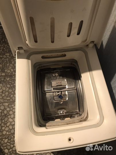 Стиральная машинка с вертикальной загрузкой