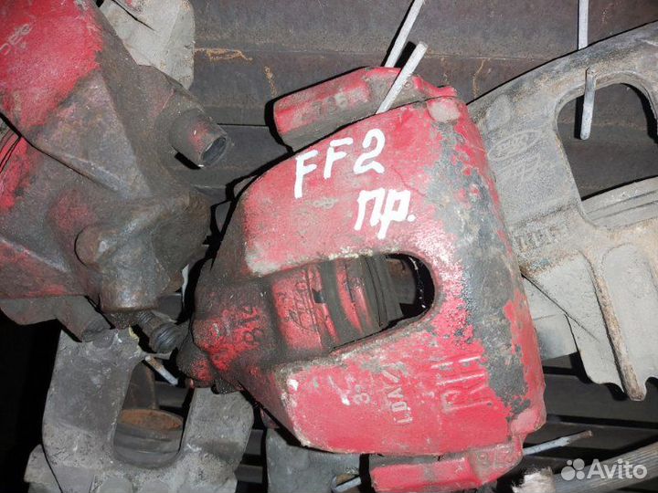 Суппорт тормозной передний правый Ford Focus 2 1.6