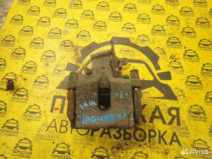 Суппорт тормозной задний левый для Jaguar XJ 2009)