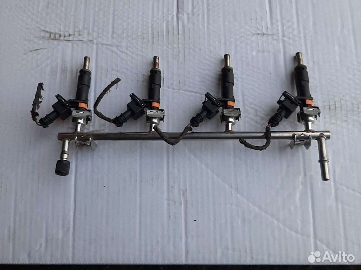 Форсунка топливная Опель Астра Н Зафира В