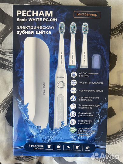 Электрическая зубная щетка