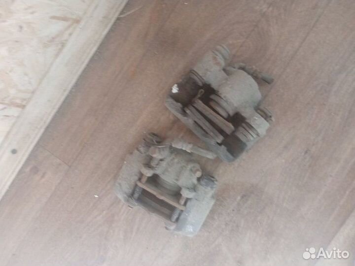 Суппорт тормозной задний Chery Tiggo T11 2009