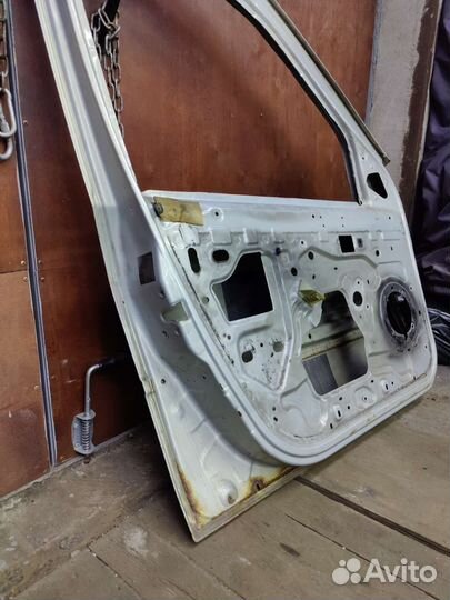 Дверь передняя левая (водителя) Renault Logan 1