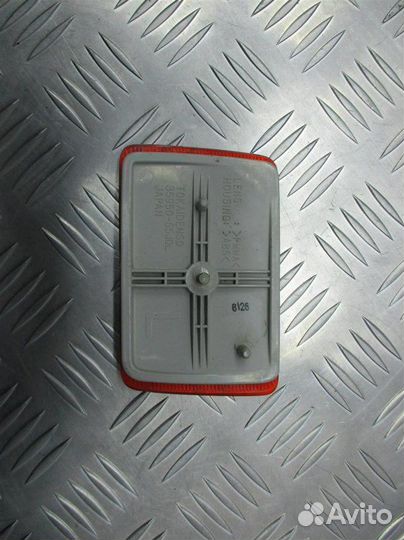 Отражатель в бампер задний левый Suzuki Grand