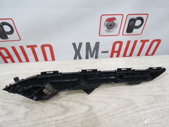 Кронштейн заднего бампера левый Toyota Corolla 150