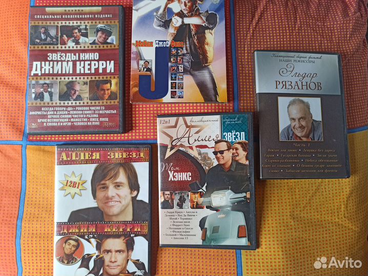 Диски DVD с фильмами и сериалами