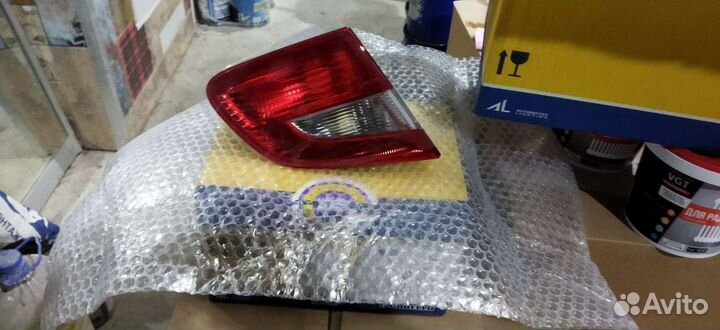 Задний фонарь левый skoda superb 2011
