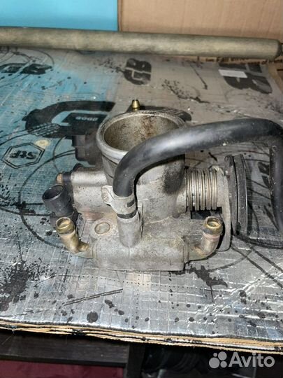 Дроссельная заслонка