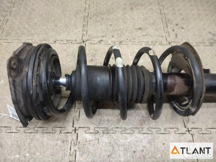 Стойка передняя левая nissan note