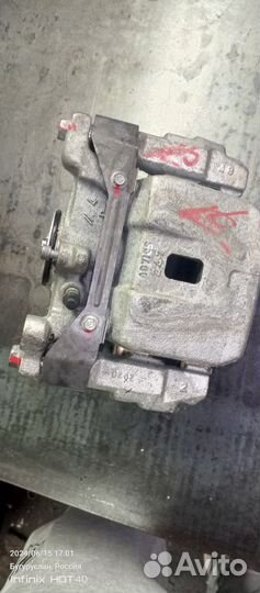 Суппорт тормозной задний левый Ленд Крузер 300