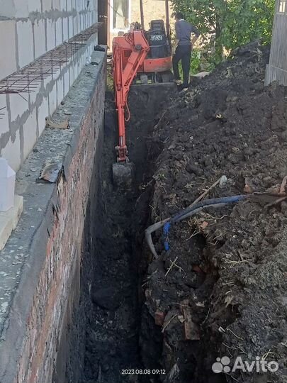 Услуга миниэкскаватора